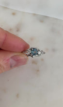 Load and play video in Gallery viewer, Cherry Twig Engagement Ring in Platinum with Montana Sapphire and Canadamark Diamonds
