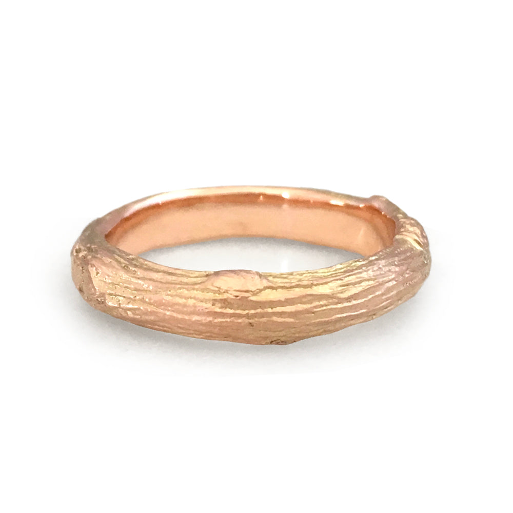 Twig wedding ring for men with woodgrain texture in 9 carat gold