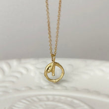 Load image into Gallery viewer, Willow Twig Necklace with Circle Charm with wood texture and bud drop
