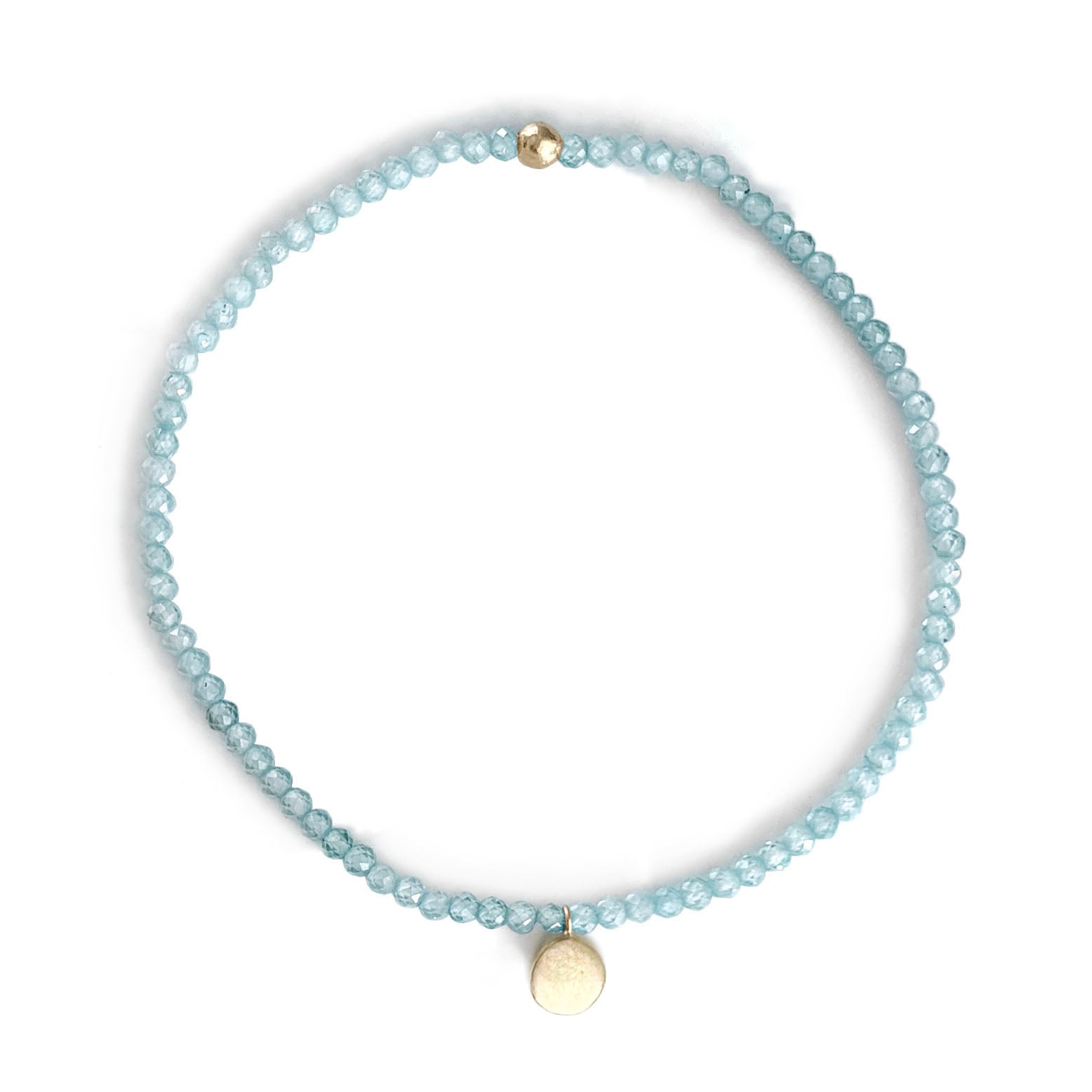 Stretch Bracelet with Blue Zircon and 9 Carat Gold Disc Charm