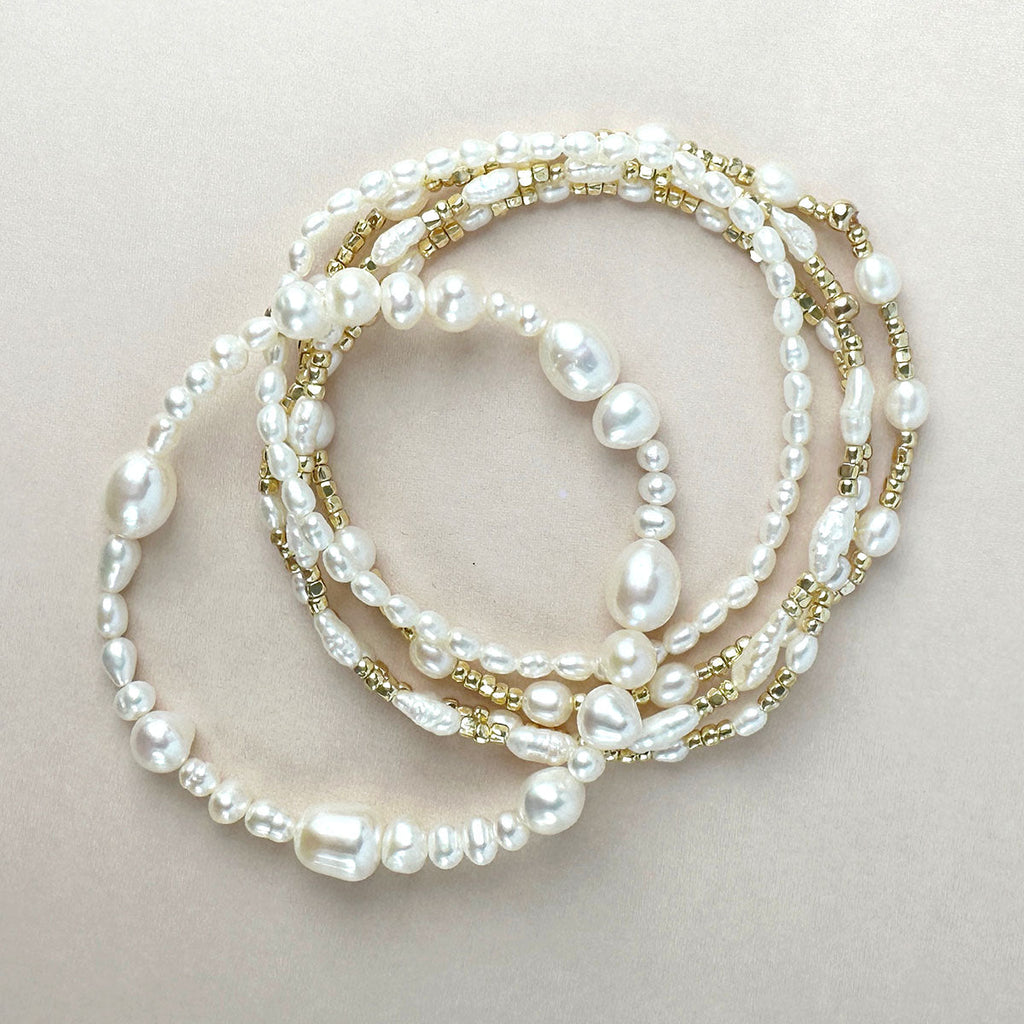 Stretch Bracelet with Medium Oval Freshwater Pearls and Metallic Nugget Beads