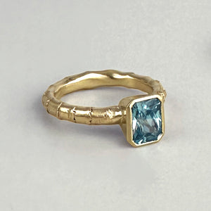 Hebe Twig Ring with Radiant Cut Blue Zircon