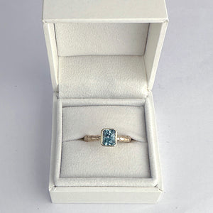 Hebe Twig Ring with Radiant Cut Blue Zircon