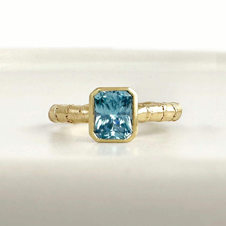 Hebe Twig Ring with Radiant Cut Blue Zircon