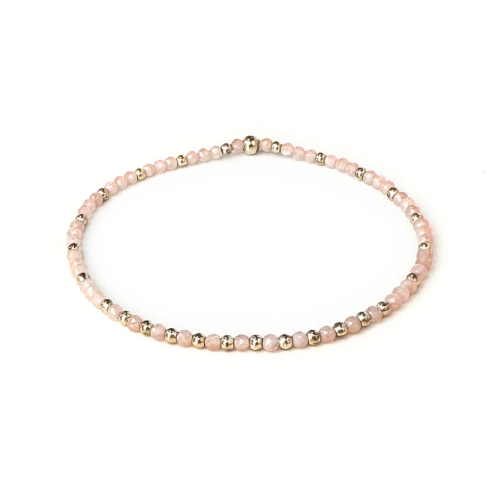 Stretch Bracelet with Rhodocrosite and Scattered Solid Gold Round Beads