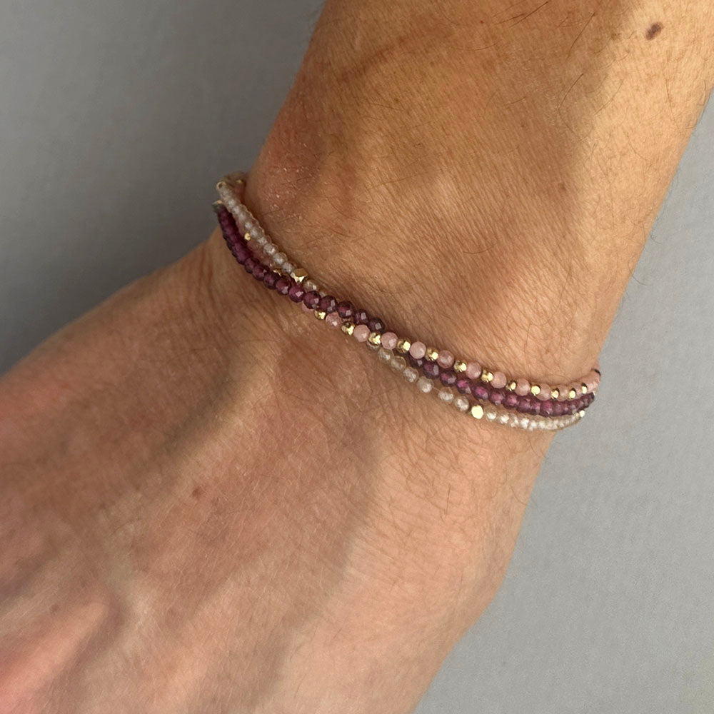 Stretch Bracelet with Rhodocrosite and Scattered Solid Gold Round Beads