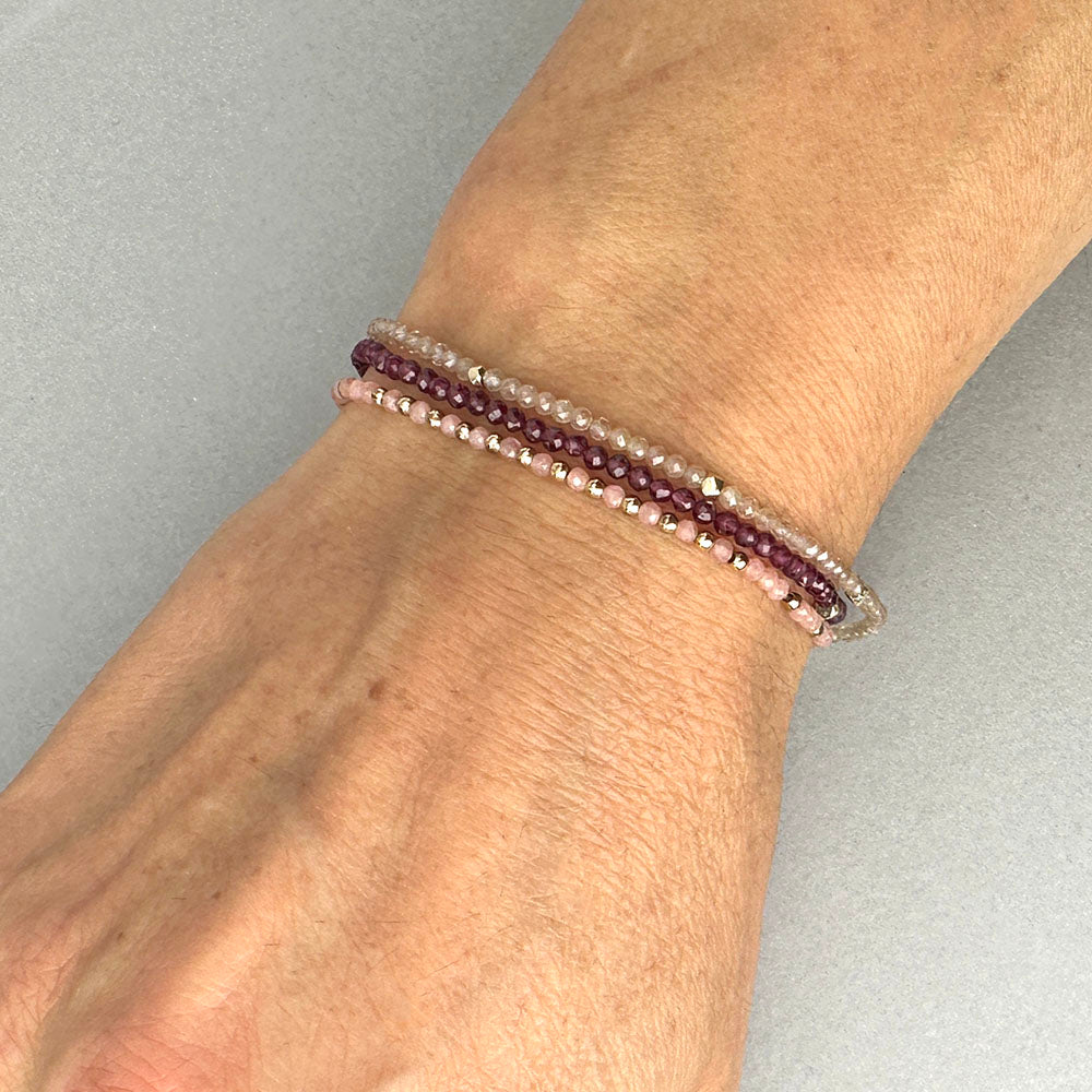 Stretch Bracelet with Rhodocrosite and Scattered Solid Gold Round Beads