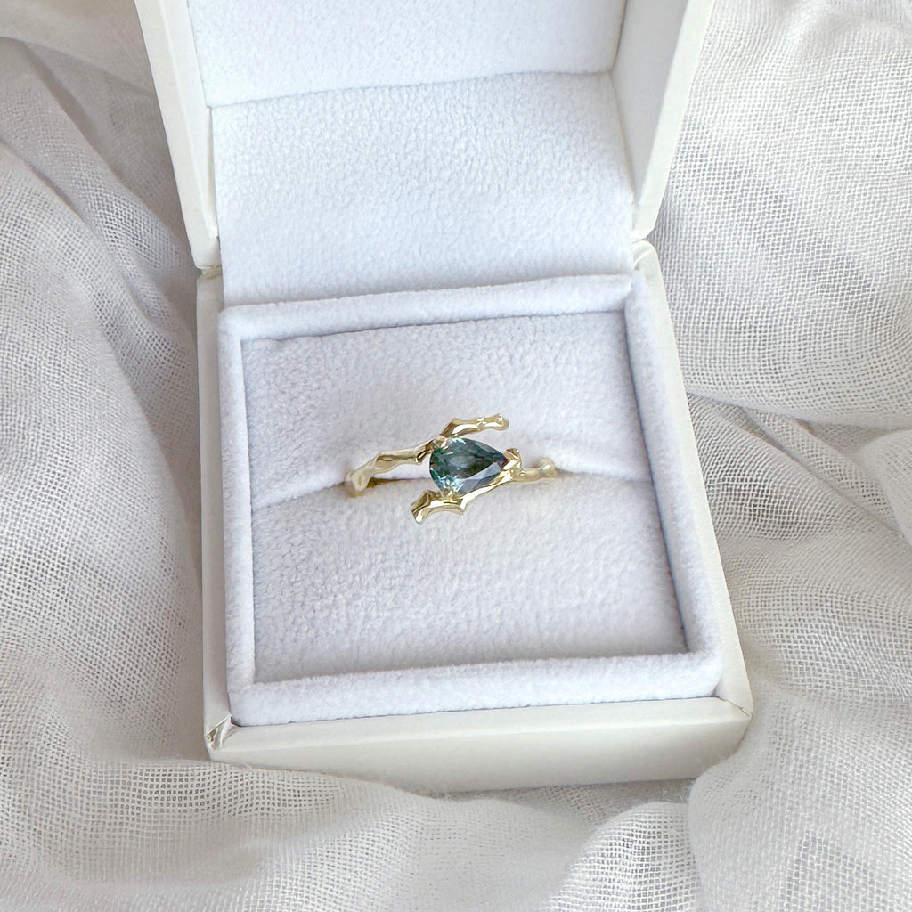 Twig Engagement Ring in 14 Carat Gold and Pear Cut Teal Sapphire