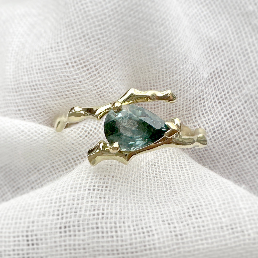 Twig Engagement Ring in 14 Carat Gold and Pear Cut Teal Sapphire