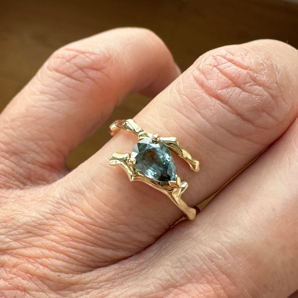 Twig Engagement Ring in 14 Carat Gold and Pear Cut Teal Sapphire
