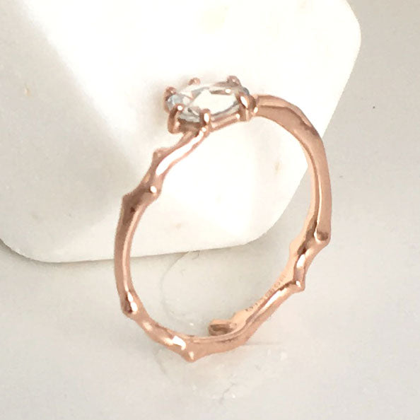 Twig Engagement Ring in 9 carat rose gold with rose cut white Ceylon sapphire