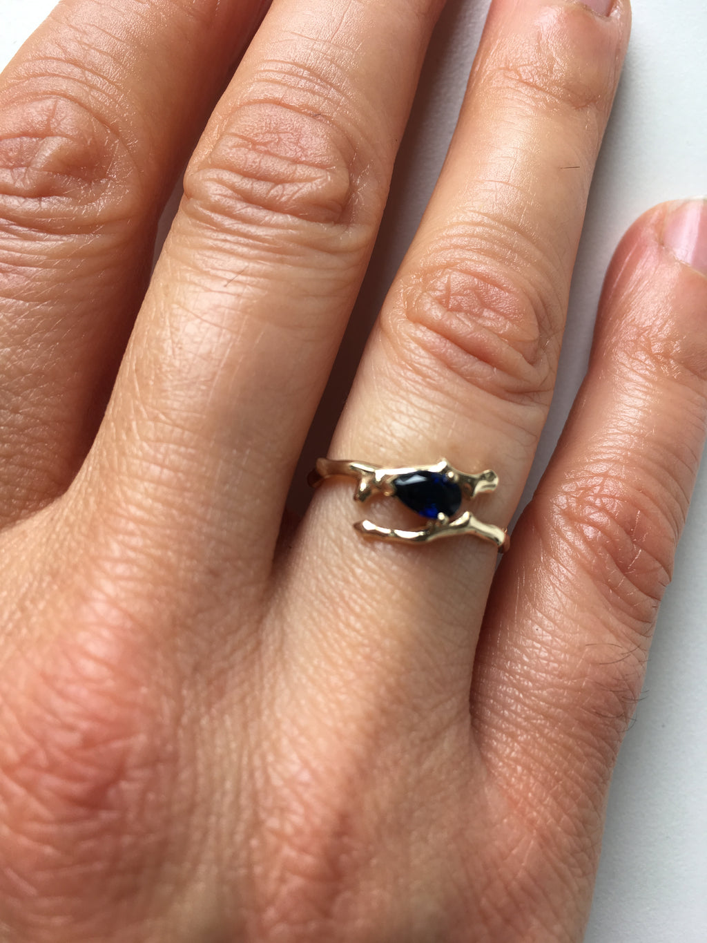 Twig Engagement Ring in 9 carat gold with pear cut Australian blue sapphire
