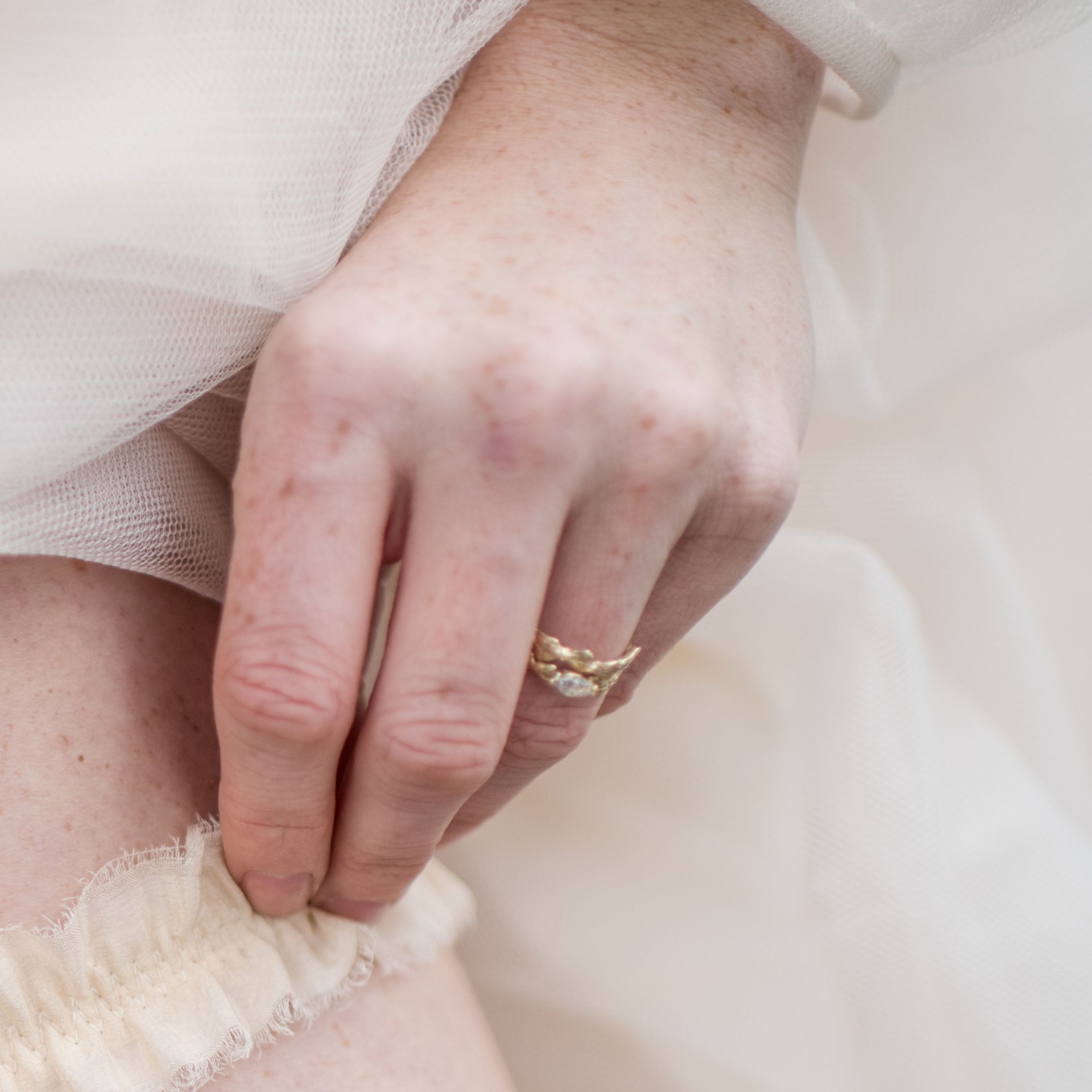 Conifer Leaf Engagement Ring in 9 carat Gold with Marquise Cut Sapphire