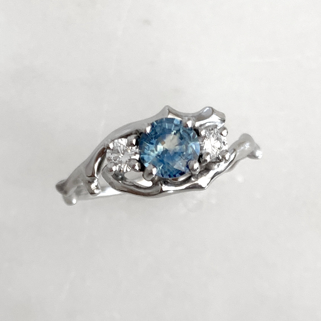 Cherry Twig Engagement Ring in Platinum with Montana Sapphire and Canadamark Diamonds