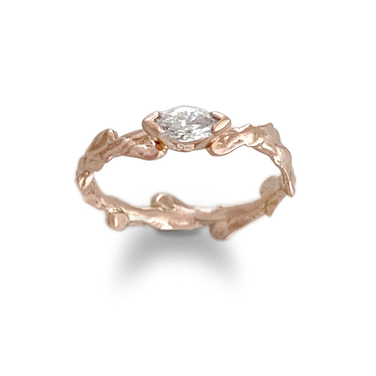 Conifer Leaf Engagement Ring in 9 carat Gold with Marquise Cut Sapphire