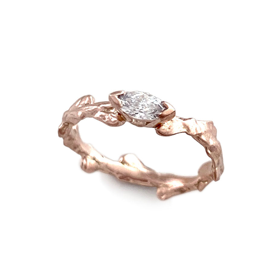 Conifer Leaf Engagement Ring in 9 carat Gold with Marquise Cut Sapphire