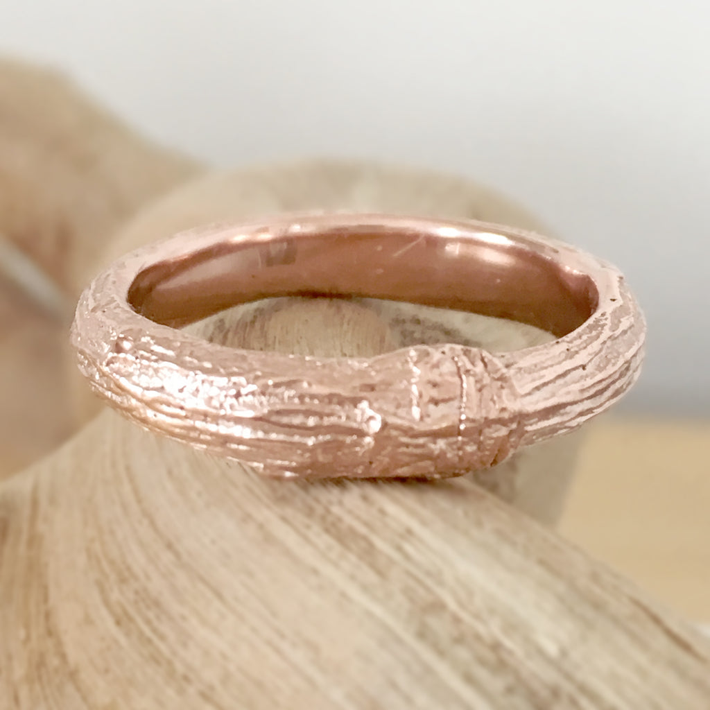 Twig wedding ring for men with woodgrain texture in 9 carat gold
