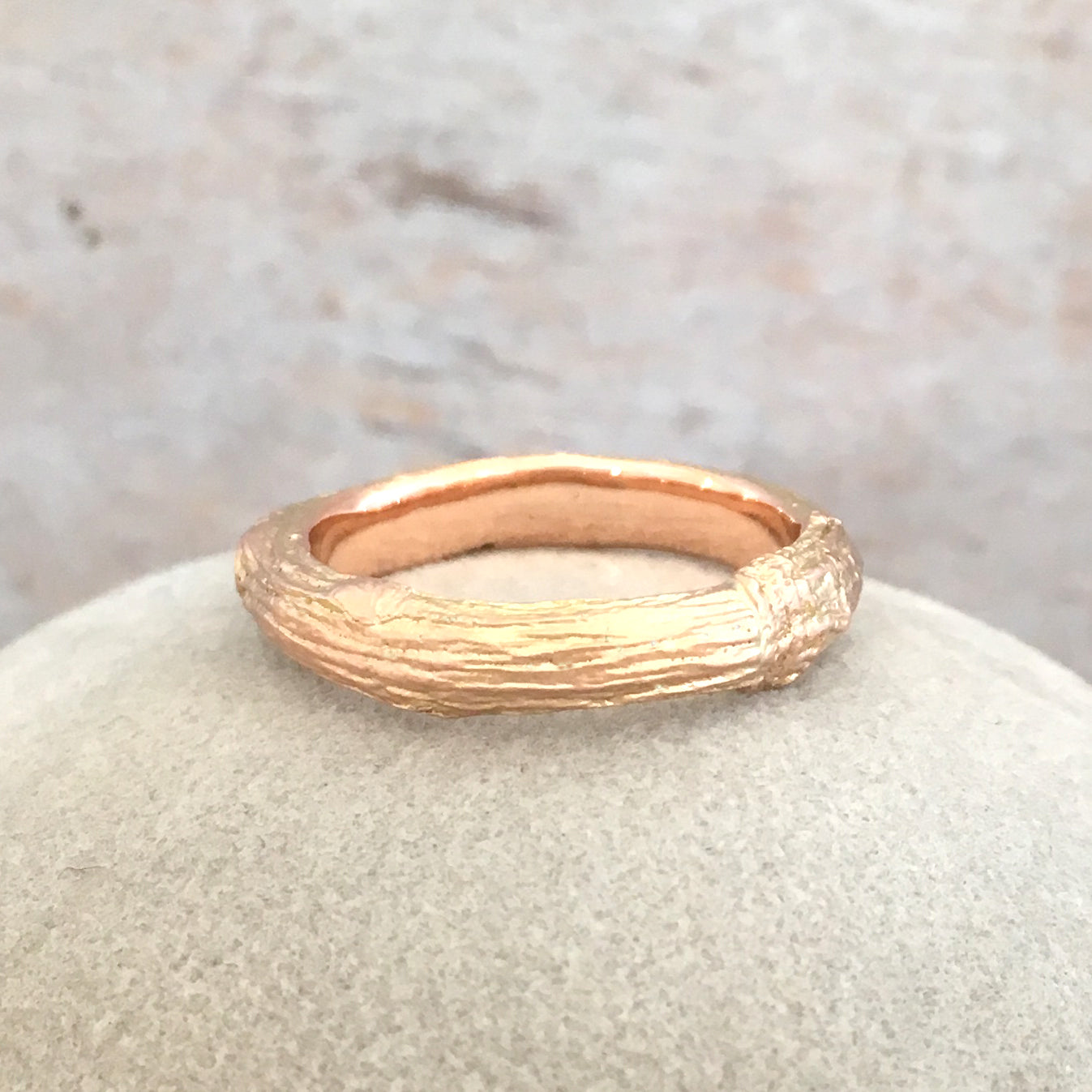 Twig wedding ring for men with woodgrain texture in 9 carat gold