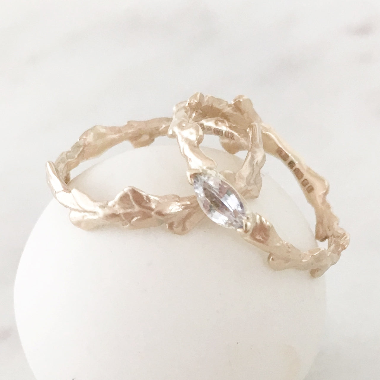 Conifer Leaf Engagement Ring in 9 carat Gold with Marquise Cut Sapphire