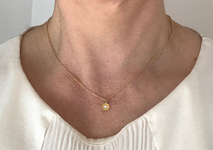 Gold pendant necklace set with 1mm diamond