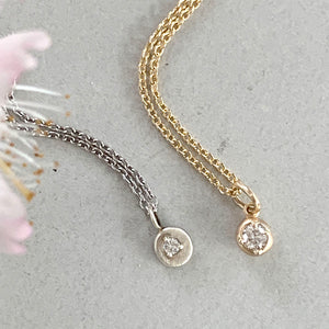 Gold pendant necklace set with 3mm diamond